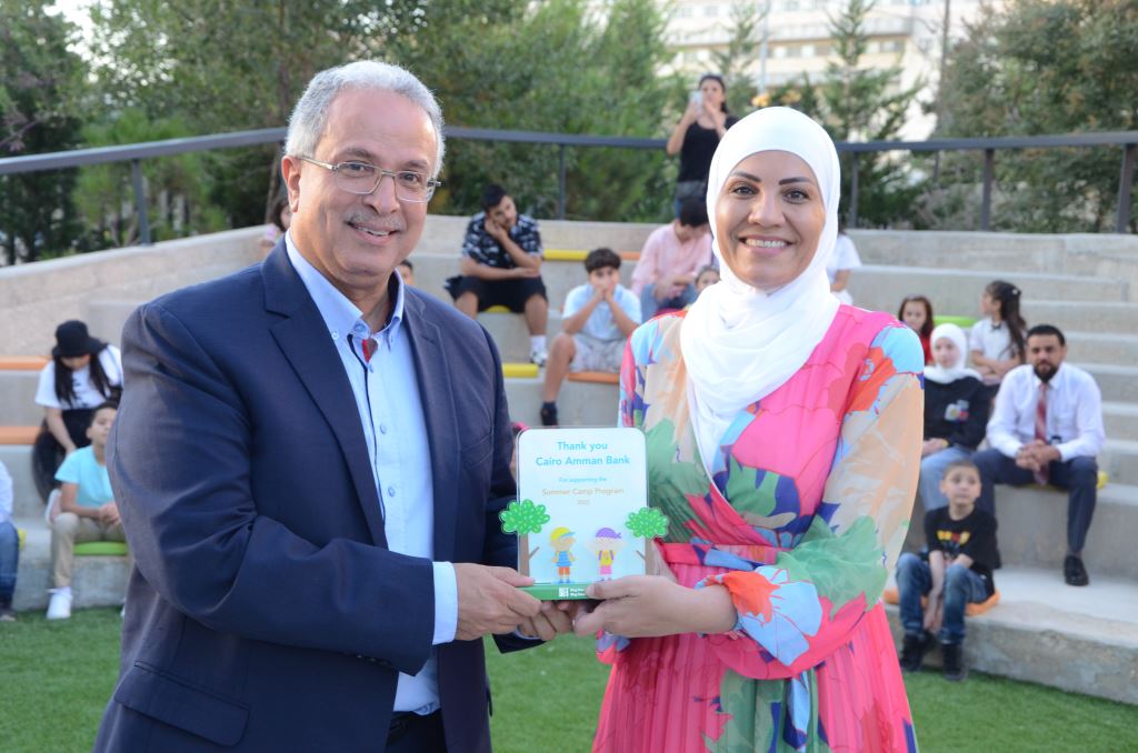 صورة حول : بنك القاهرة عمان يرعى افتتاح المخيّم الصيفي السنوي السابع عشر لمؤسسة الحسين للسرطان بنك القاهرة عمان يرعى افتتاح المخيّم الصيفي السنوي السابع عشر لمؤسسة الحسين للسرطان
