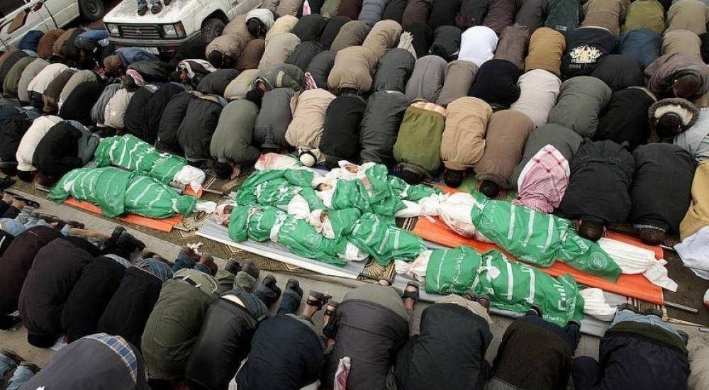 نشطاء يحيون ذكرى مجزرة عائلة نزار ريان..