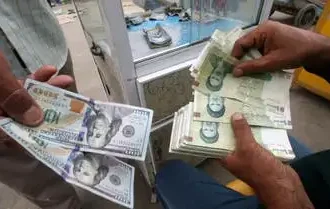 الريال الإيراني ينخفض الى مستوى قياسي امام الدولار