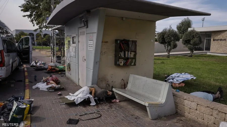 صورة حول : صور الألم: جوائز تكرم رويترز لتوثيق مأساة "حرب غزة" قتلى إسرائيليون في هجوم حماس في 7 أكتوبر