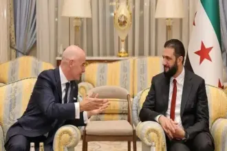 صورة حول : الشرع يلتقي رئيس الفيفا الشرع يلتقي رئيس الفيفا